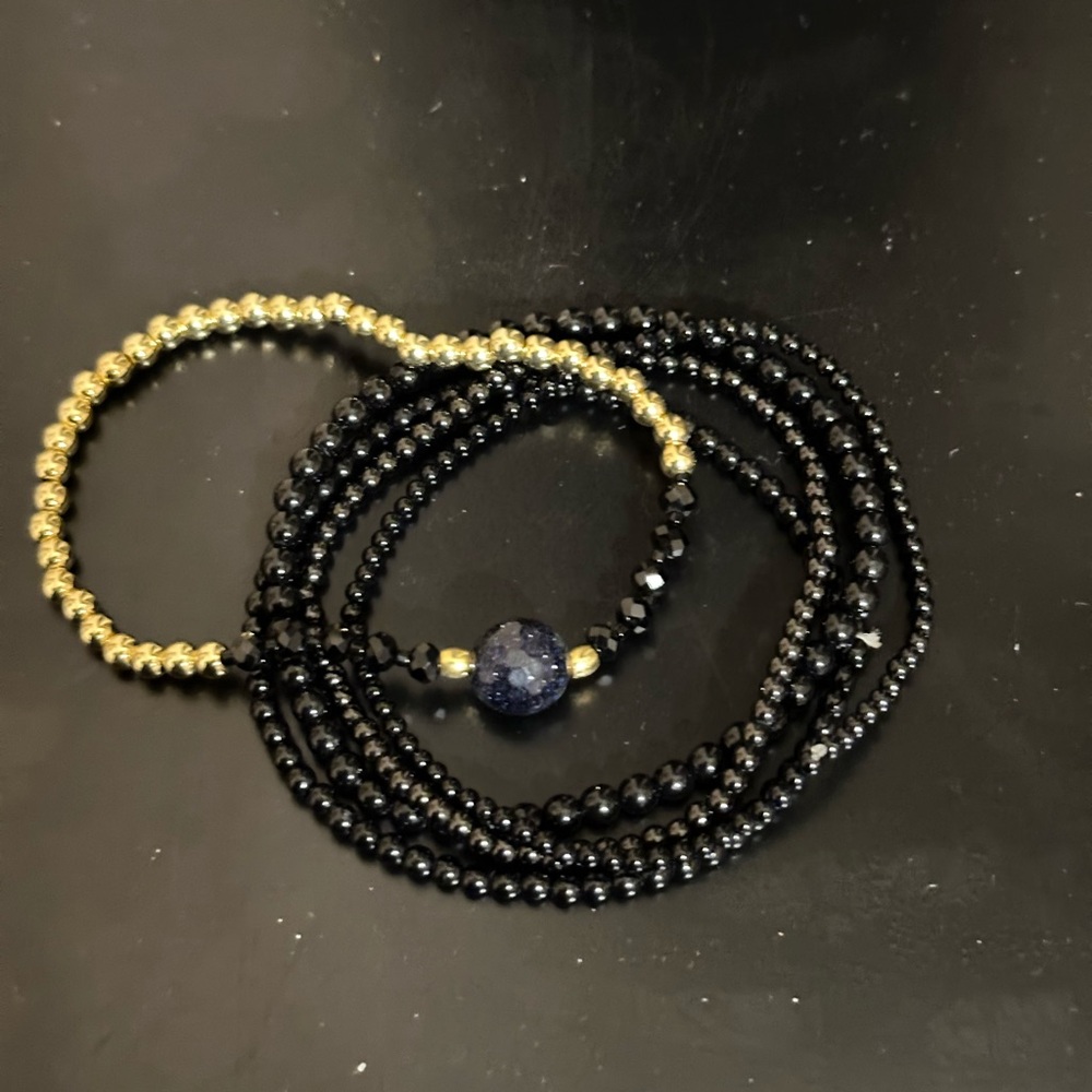 Black and Gold Bracelets